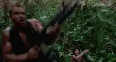 Arnold fires rocket launcher in jungle