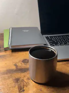 steam rising from coffee cup