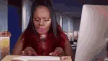 Woman typing on keyboard and talking