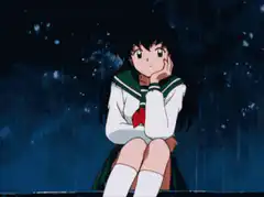 Ranma sitting in the rain
