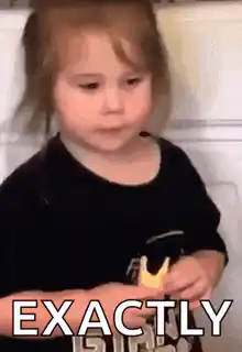 Toddler eating cracker exactly