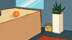 orange falls off table