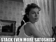 Woman stacking satoshis