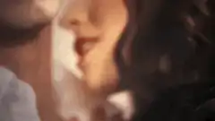 Man and woman kissing passionately
