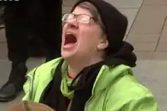 Person screaming with mouth wide open