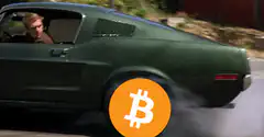 Steve McQueen driving with Bitcoin wheel