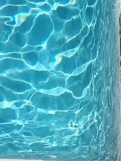 Blue pool water ripples