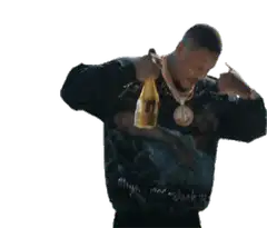 Man drinking from gold bottle