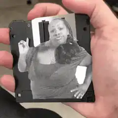 Woman on floppy disk