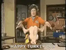 Woman holding raw turkey Happy Turkey Day