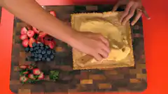 Spreading cream on tart crust