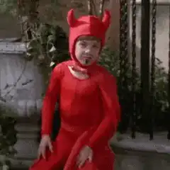 Devil kid waves and smiles