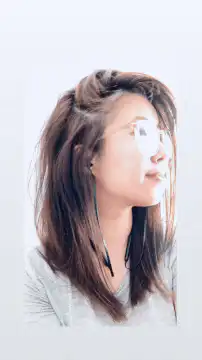 Woman with glasses turns head