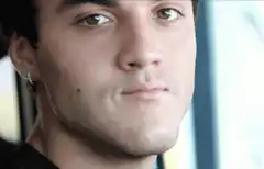 Man smirking and smiling