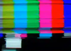 Color bars with heavy glitch distortion