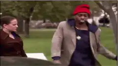 Dwight Schrute walking with arms out