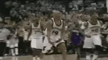 Basketball player adjusting shorts