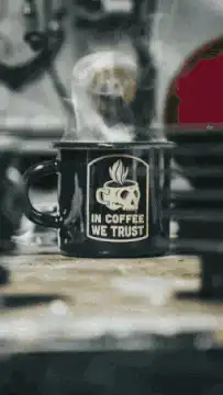 In Coffee We Trust Steam Skull Mug