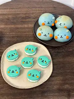 cute cat macarons on plates
