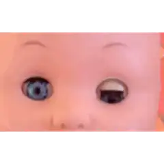 Baby doll winking