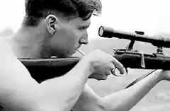 Sniper smoking a cigarette