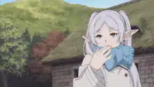 Frieren blows a kiss