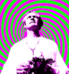 David Bowie holding flowers with psychedelic background