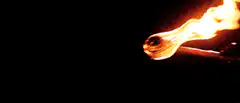 Close up of a burning match