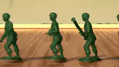 Green plastic army men marching
