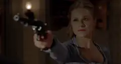 Evan Rachel Wood points gun at man