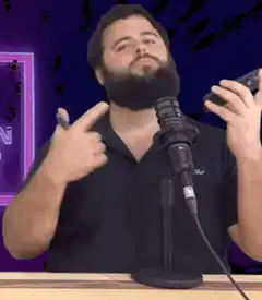 Man gesturing with hands near head