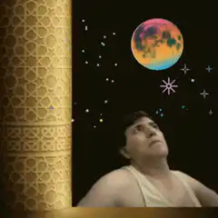 Man looking at colorful moon