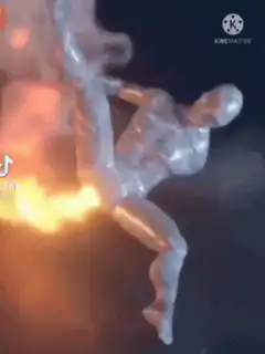 Silver humanoid figure on fire