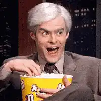 Bill Hader eating popcorn excitedly