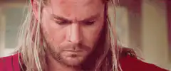 Chris Hemsworth as Thor looking down