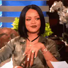 Rihanna nodding and smiling