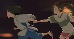 Chihiro and Haku running hand in hand