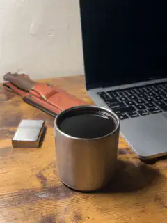 steam rising from coffee cup