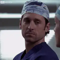 Derek Shepherd smirking