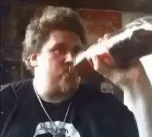 Jonah Hill drinking from a bottle