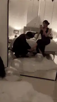 Man proposes to woman with balloons