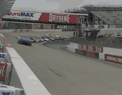 NASCAR race cars speeding around a turn