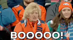 Man in orange jersey booing
