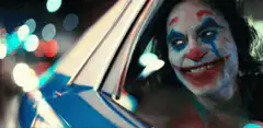 Joker laughing in car