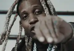 Travis Scott pointing at camera