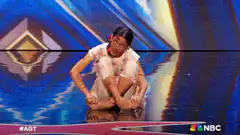 Girl doing splits on stage