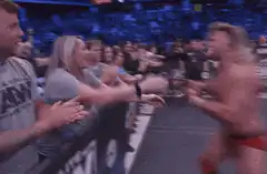 Wrestler hugs mom in crowd