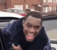 Man excitedly getting into a car