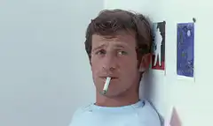 Man smoking cigarette with smoke