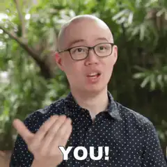 Bald man pointing and saying YOU